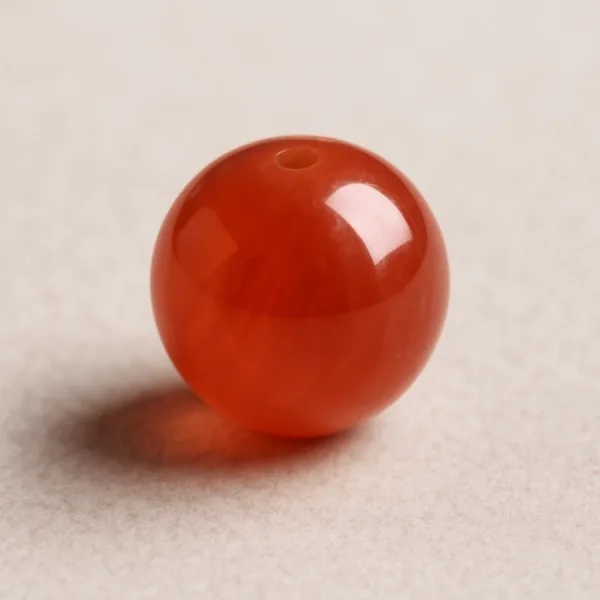 Bille Cornaline - diamètre 6mm - trou intérieur adapté 1.3mm
